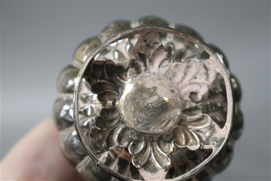 A 20th century Indian? white metal rosewater sprinkler, on pierced circular foliate base,